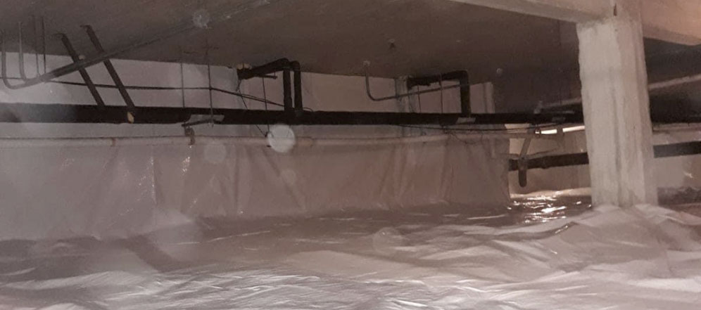 Uneven floors caused by crawl space moisture and weakened support structure beneath a West Virginia home.